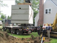 Positioning a Septic Tank Before Lowering